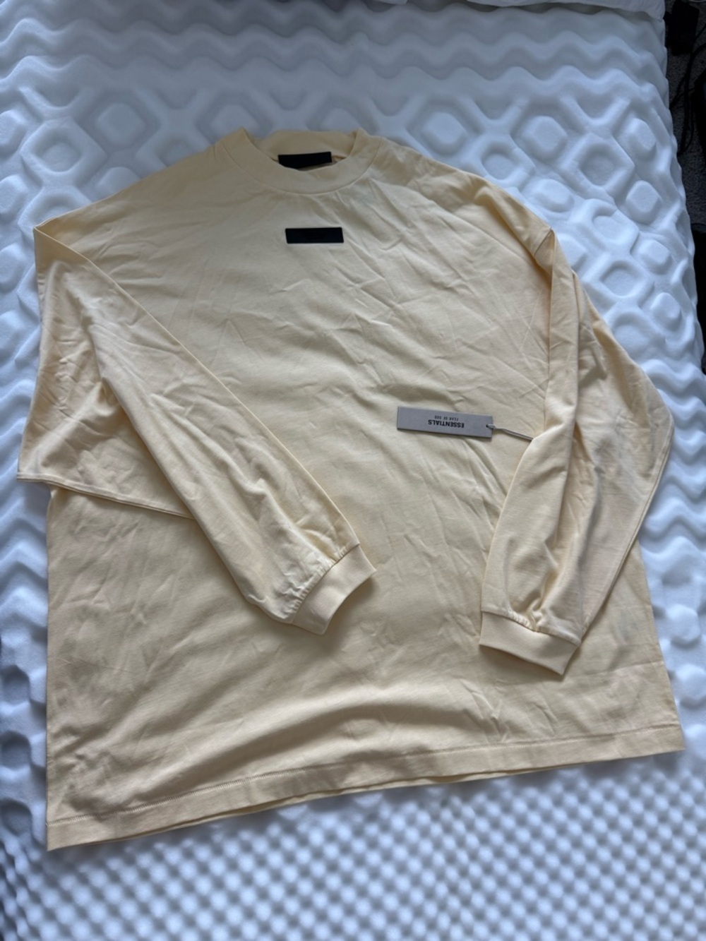 Fear of God Essentials Long Sleeve Crewneck in Pale Yellow